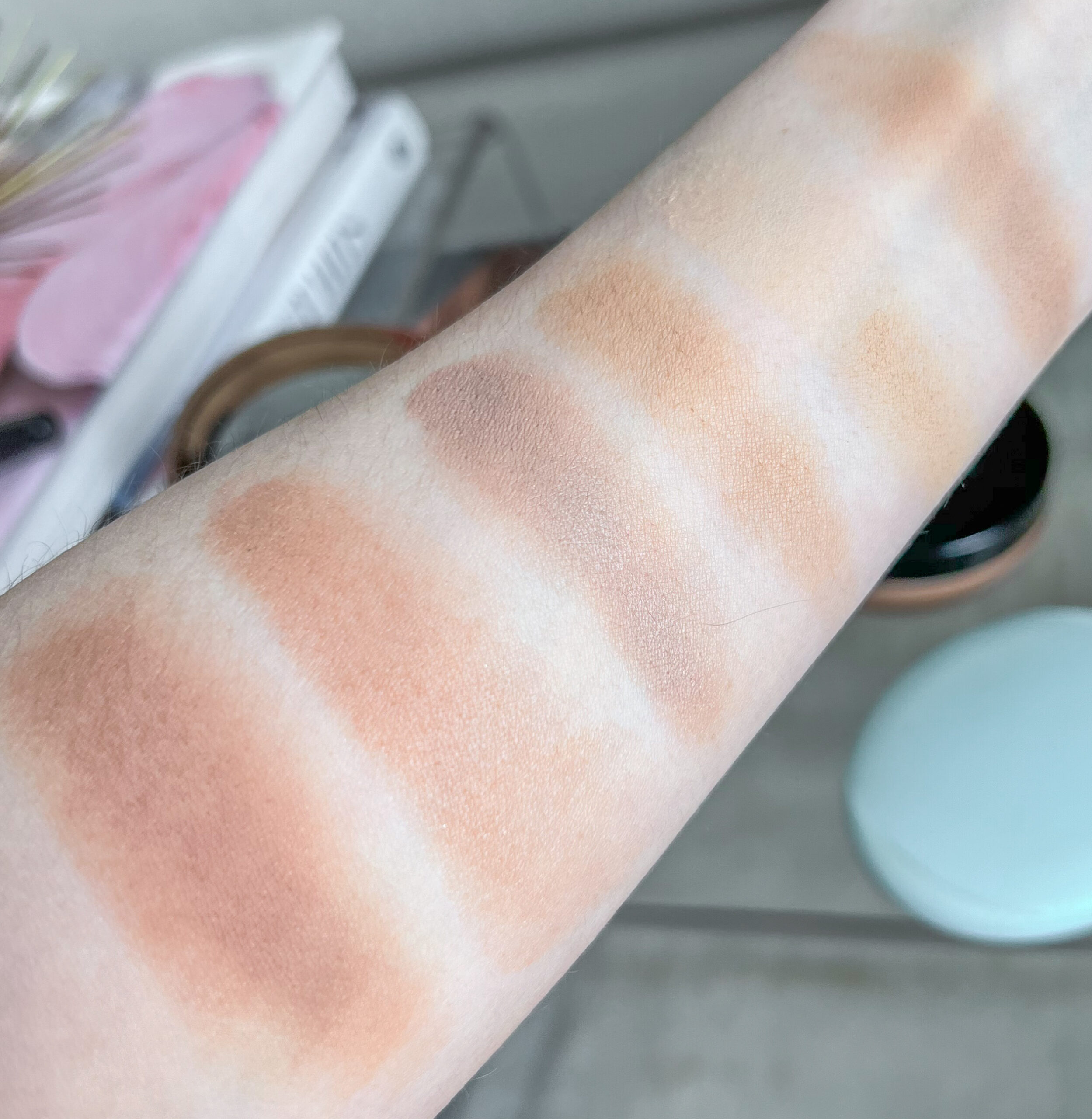 Cream bronzer comparison swatches (old and new products) - Saie