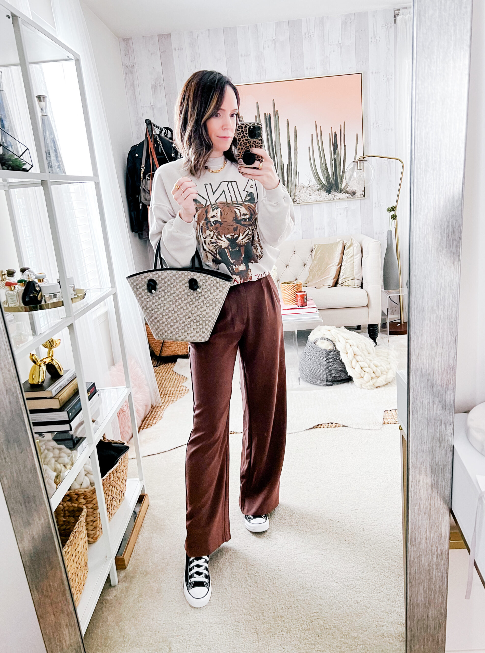 brown trousers and sweater outfit