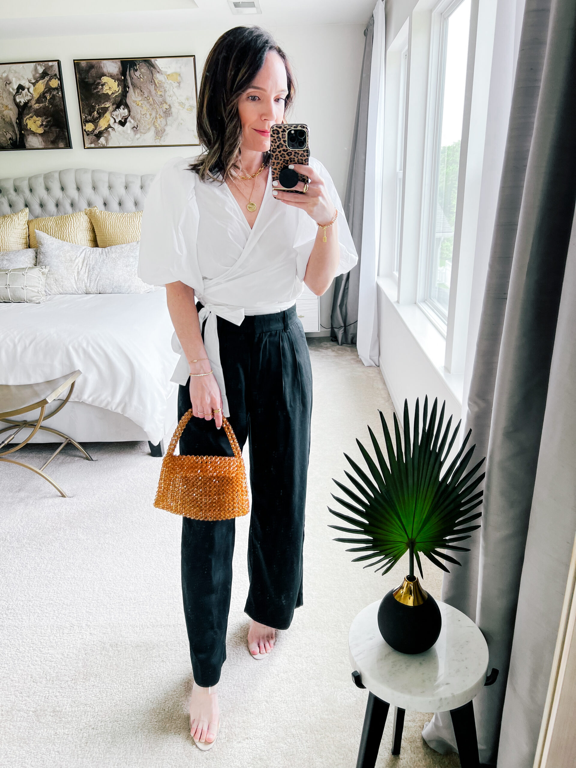 white tie wrap top and black pants