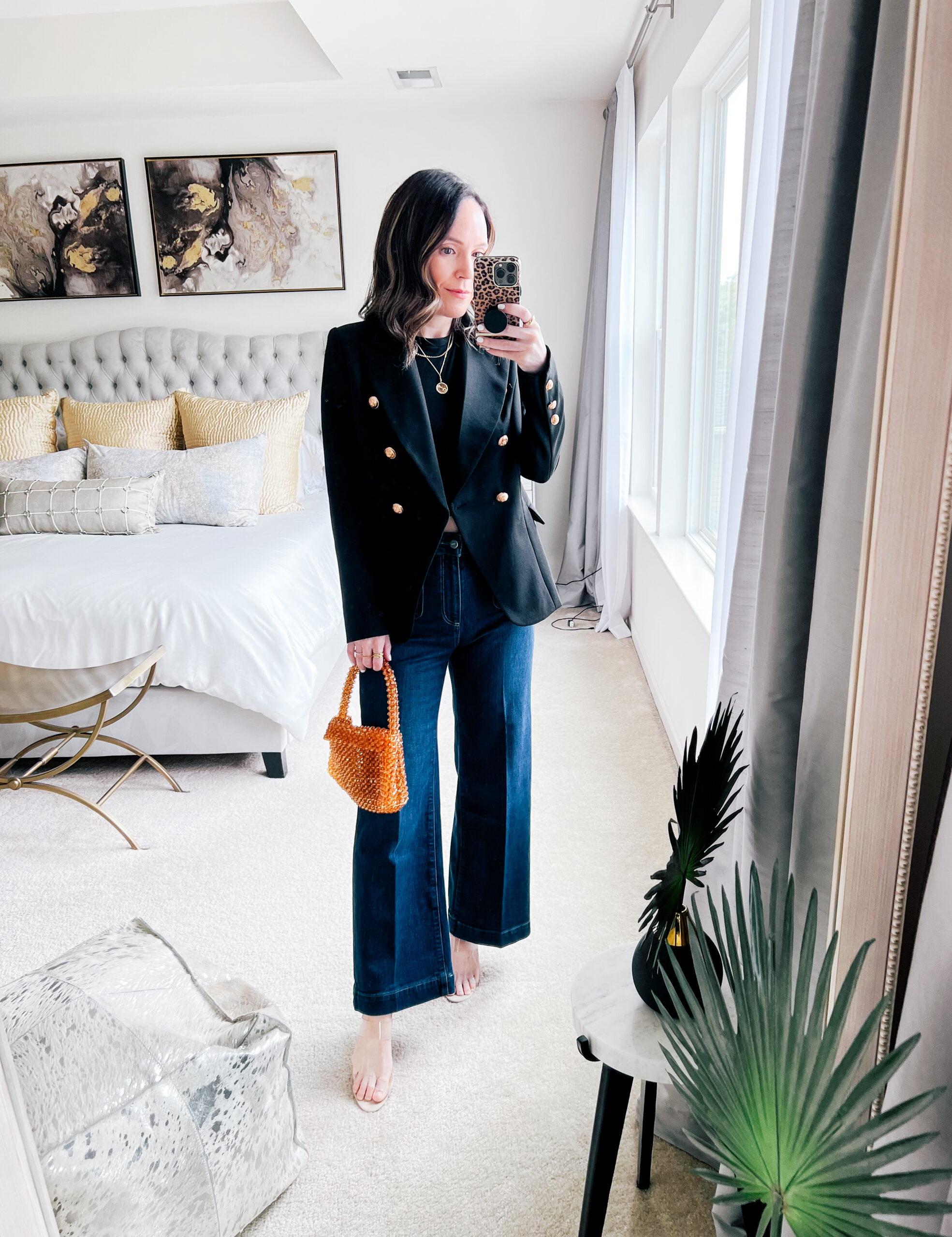 Maree Sye A Little Bit etc blogger wearing black blazer, black top, and denim pants for her Outfits I Wore - August 2023 post